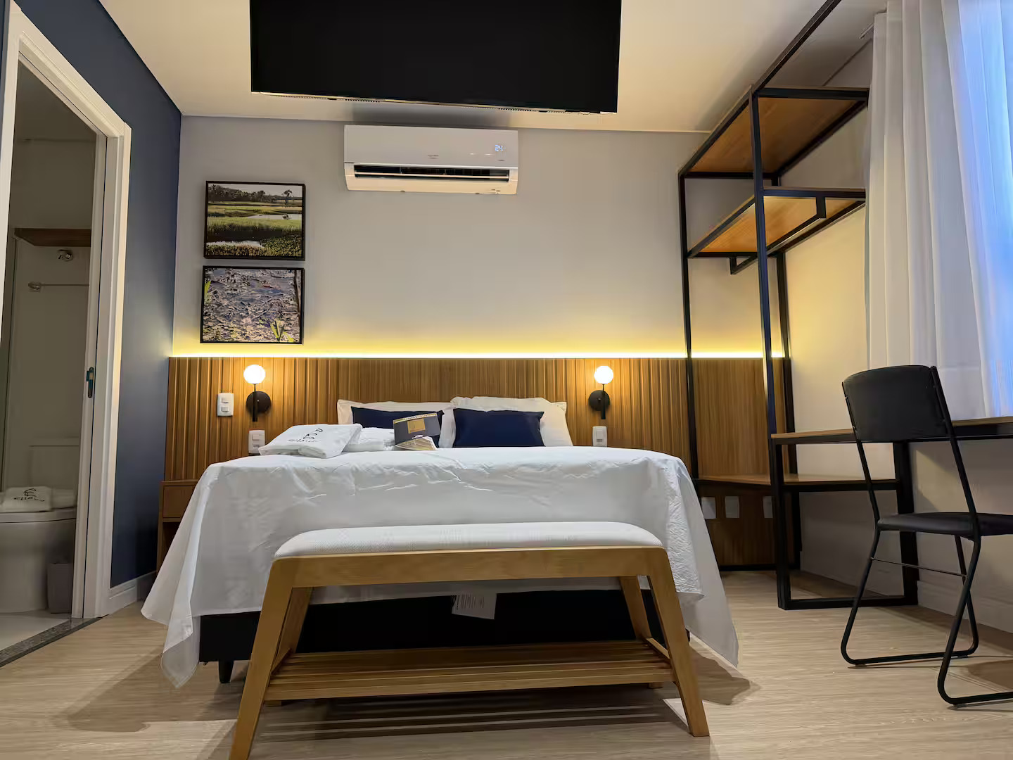 Cama da Unidade Elleva Studio do Hotel In Loft